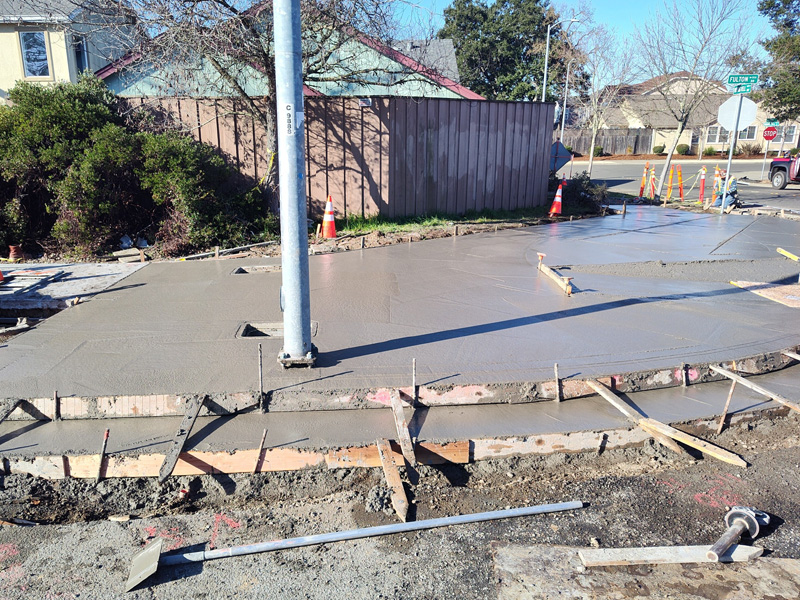 Letting the concrete set for a new sidewalk, curb, and gutter along Fulton Road