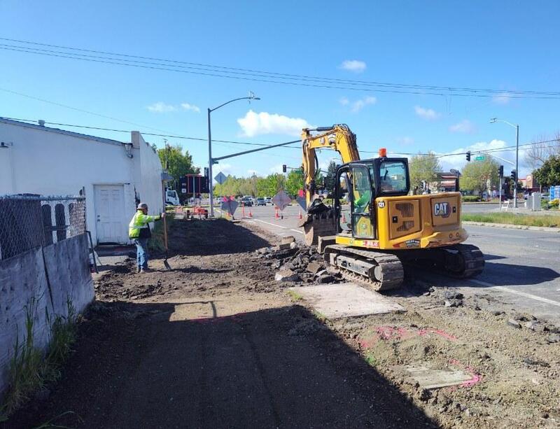 Removing the existing sidewalk along Fulton Road