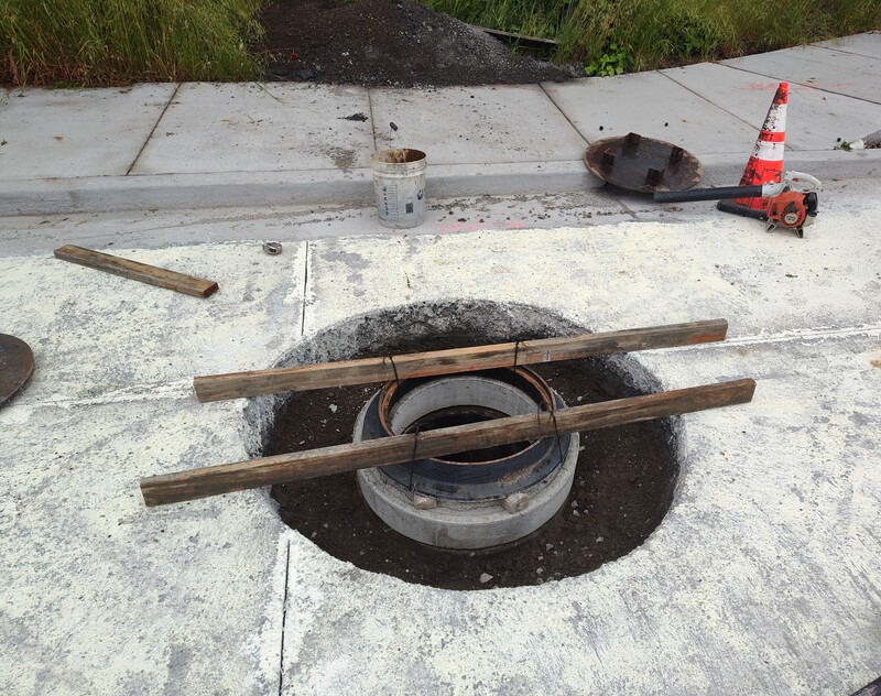 Installation of a utility access point in the new RCC pavement
