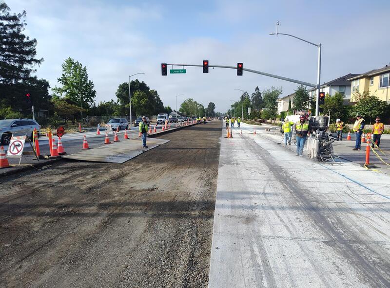 Placing saw cuts in the new RCC pavement at the Jenes Lane intersection along Fulton Road