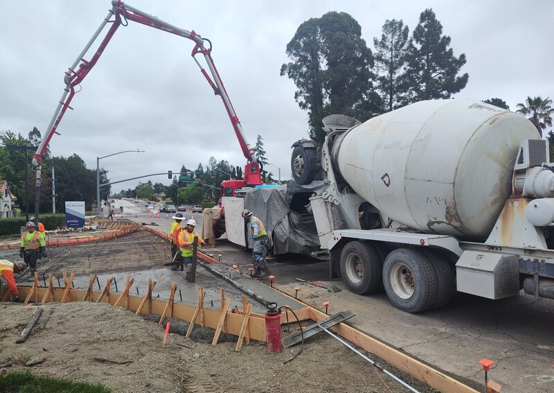 Pouring concrete for the new driveway to the Raley's shopping center