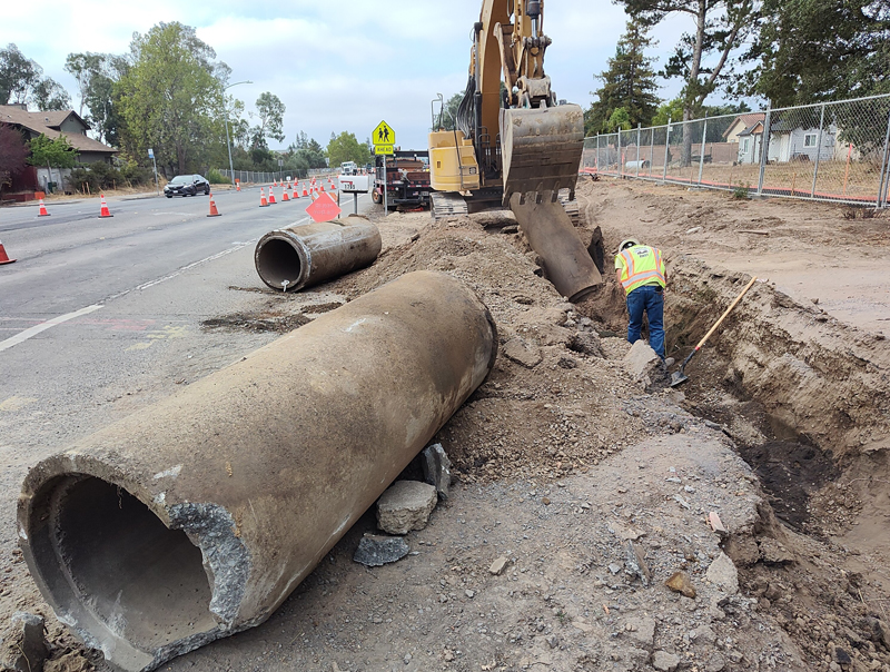 Removing the old storm drain pipe