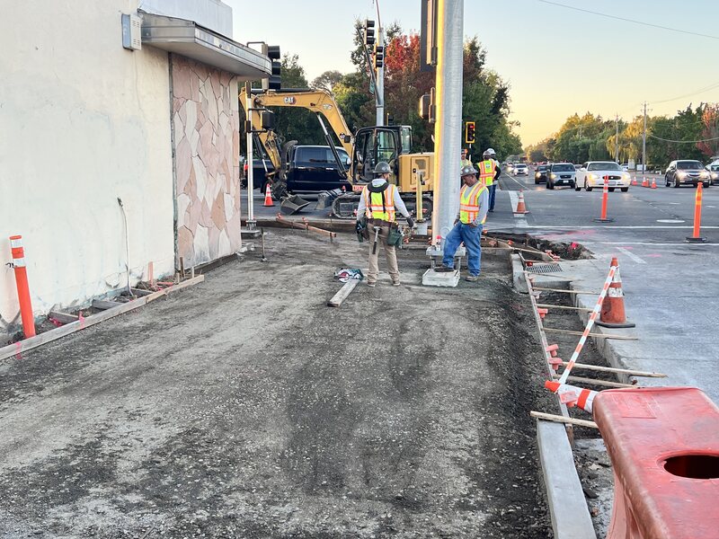 Building a new pedestrian curb ramp at the Guerneville Rd and Fulton Rd intersection