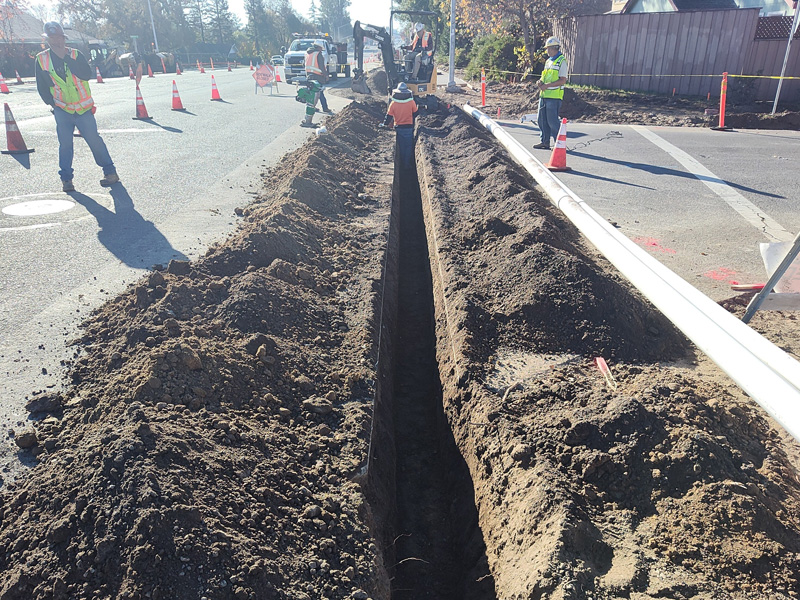 Digging the trench for the installation of new utility lines