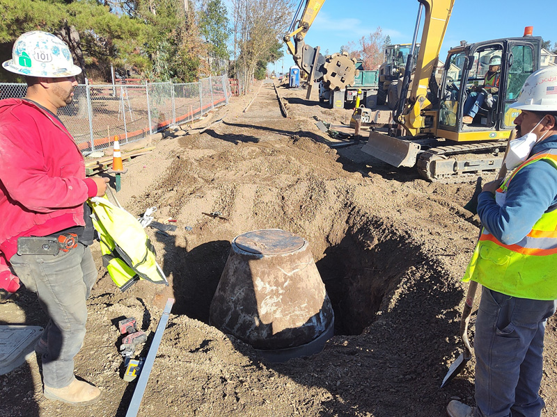 Connecting a manhole to the new storm drain pipeline